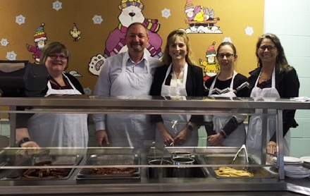 Staff behind the counter at the breakfast